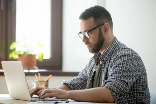 man on computer